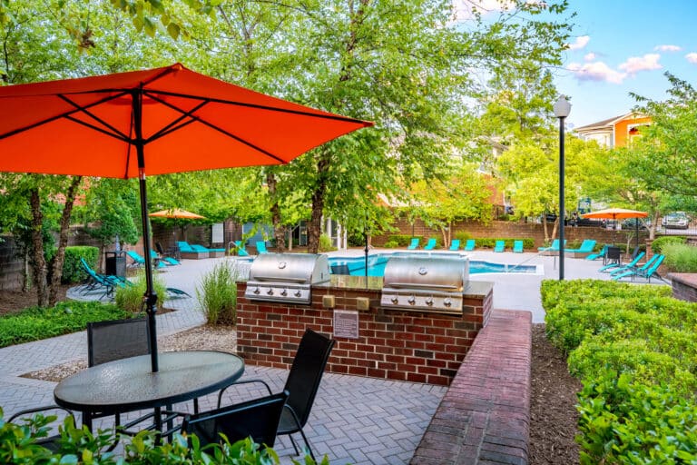 Outdoor grilling stations at our luxury apartments in Cary, NC.